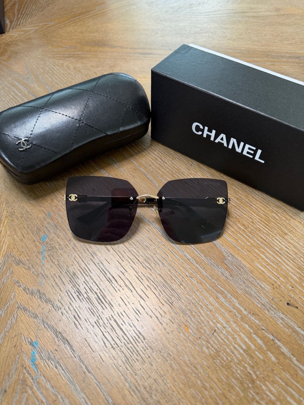Chanel Black and Gold Square Rimless Sunglasses